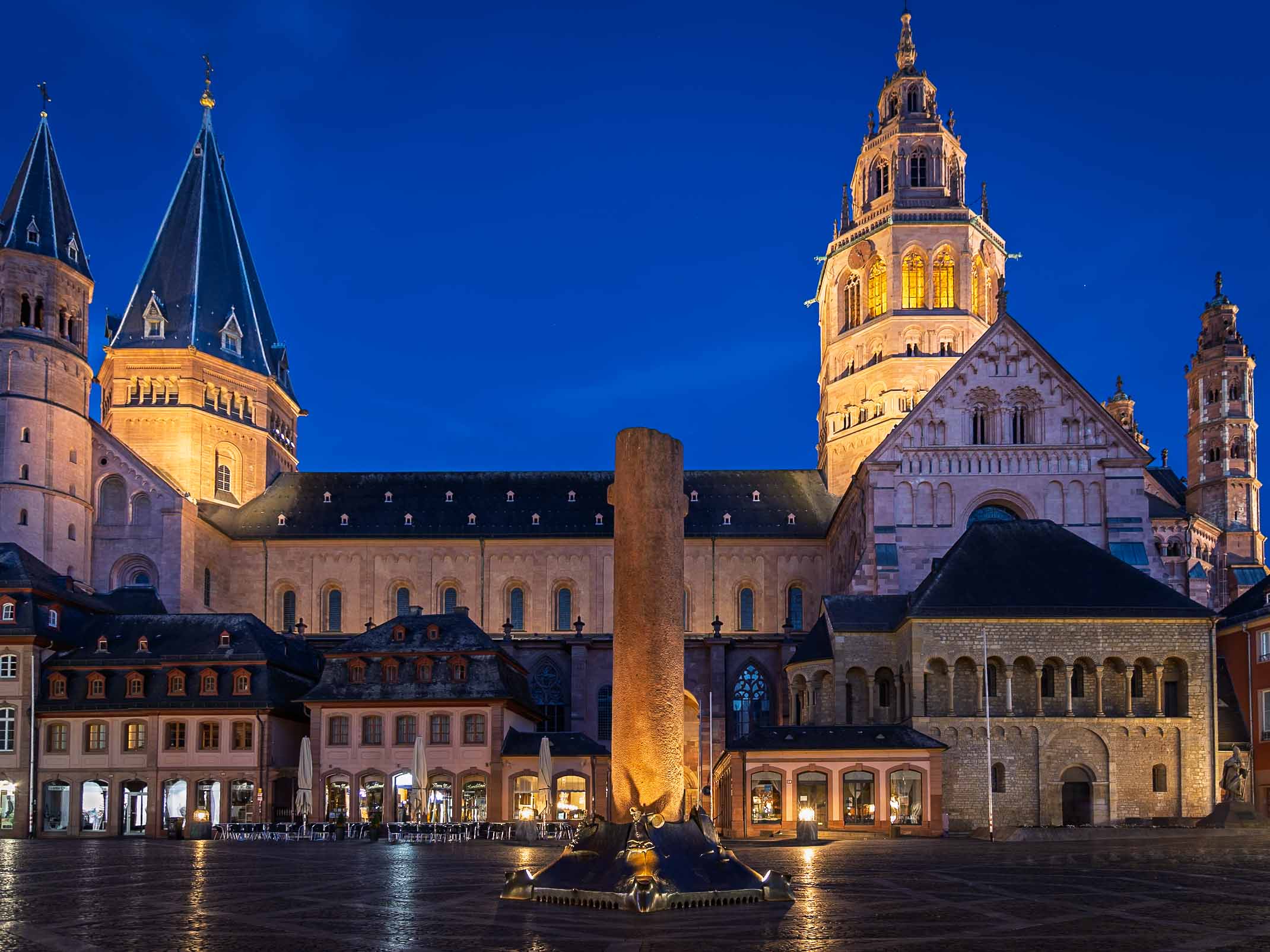 Mainz Cathedral illuminated at night in the historic city center of Mainz, Germany.